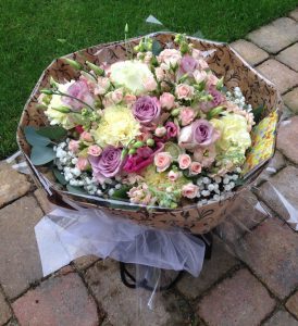 Large bouquet with mixed pastel flowers of roses, lisianthus and carnations