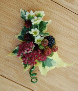 Blackberry and daisy buttonhole
